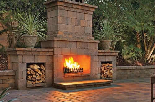 Large Outdoor Ventless Fireplace all masonry and side fire log places. 